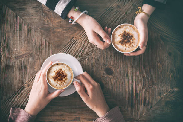 Two people having coffee and meaningful conversation